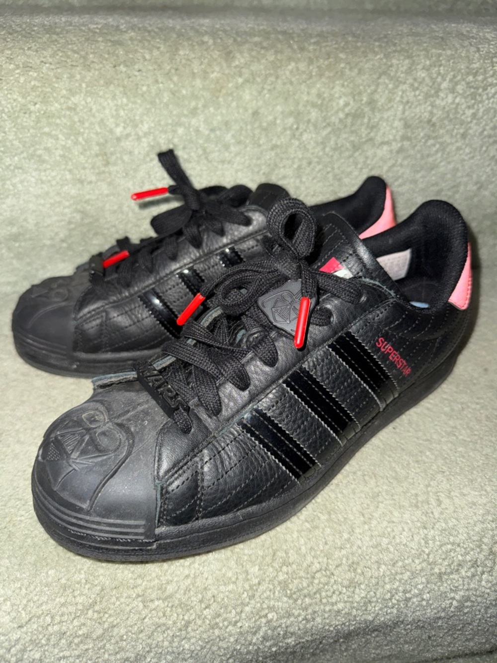 Darth Vader Star Wars Adidas Black Leather Superstar Sneakers with accents.
